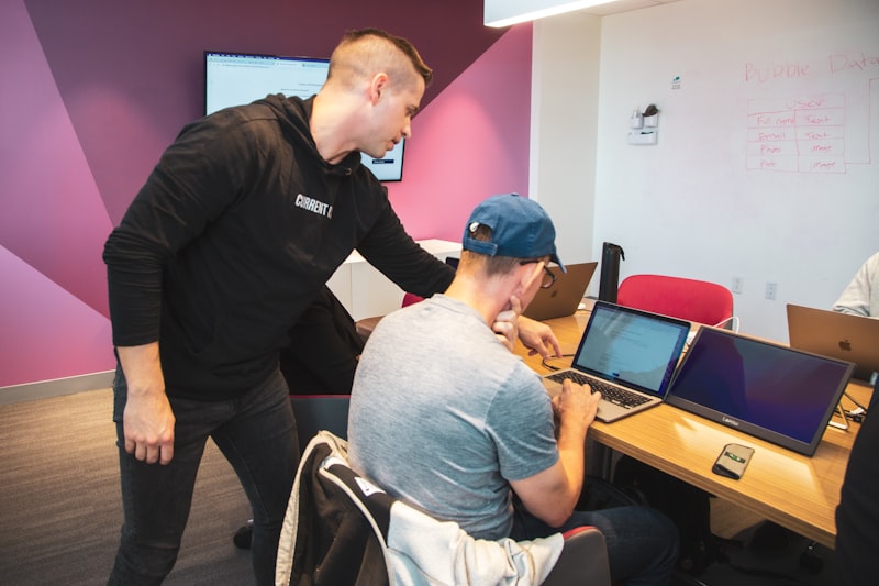 A team of cybersecurity professionals collaborating in a modern office environment