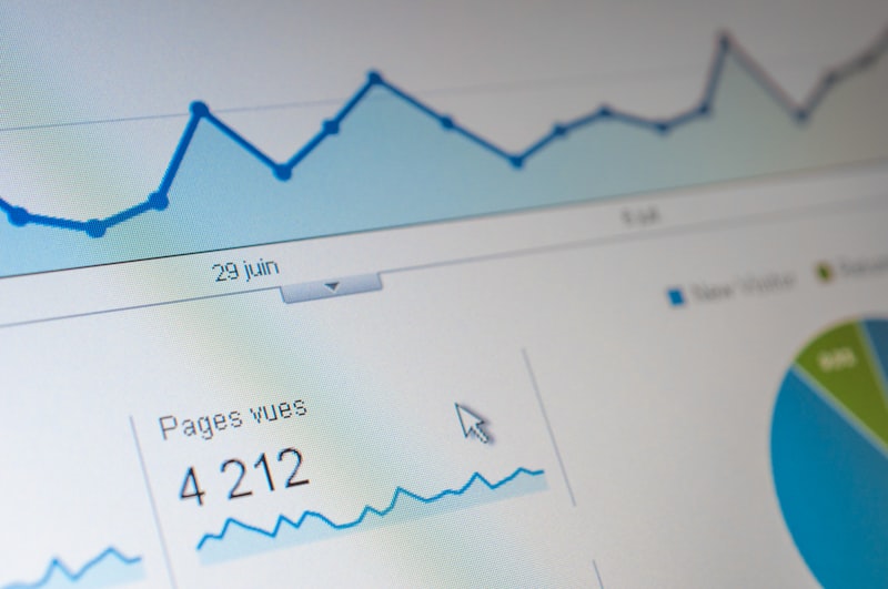 Analytics dashboard showing page views on a laptop screen